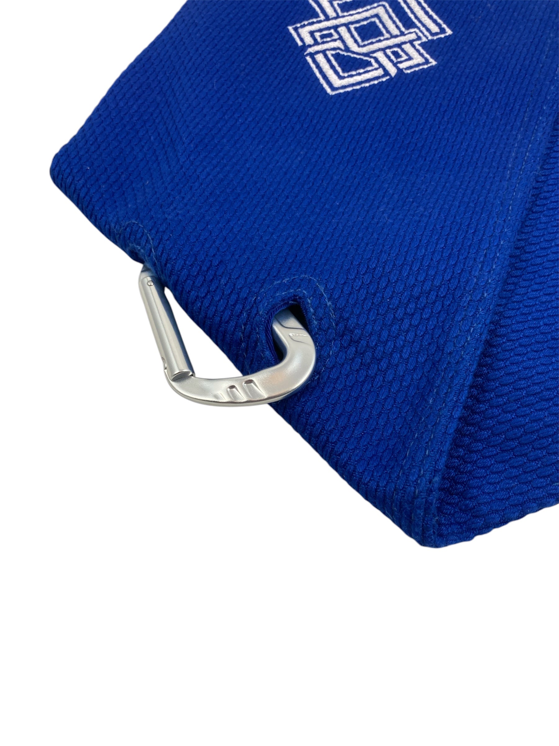 Blue Kodo Gi Grip with embroidered logo, featuring a custom aluminum carabiner attached to it used for martial arts such as BJJ and Judo and Grip Strength.