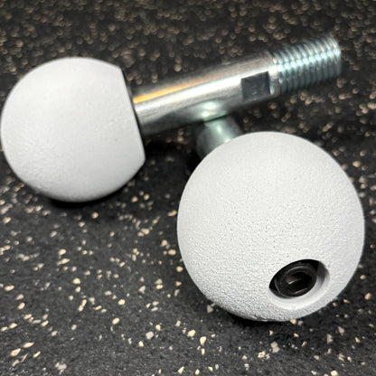 Two Kodo white spherical climbing holds for gym equipment squat rack attachments and crossmember