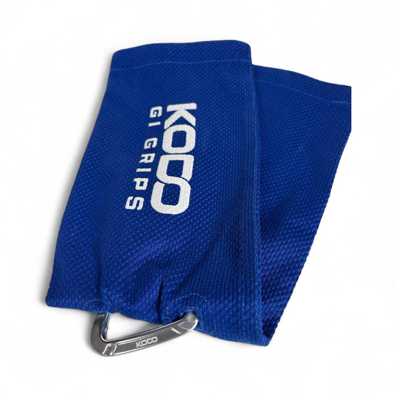 Blue Kodo Gi Grip with embroidered logo, featuring a custom aluminum carabiner attached to it used for martial arts such as BJJ and Judo and Grip Strength. These are premium Jiu Jitsu Grip trainers and Judo Grip Trainers. 