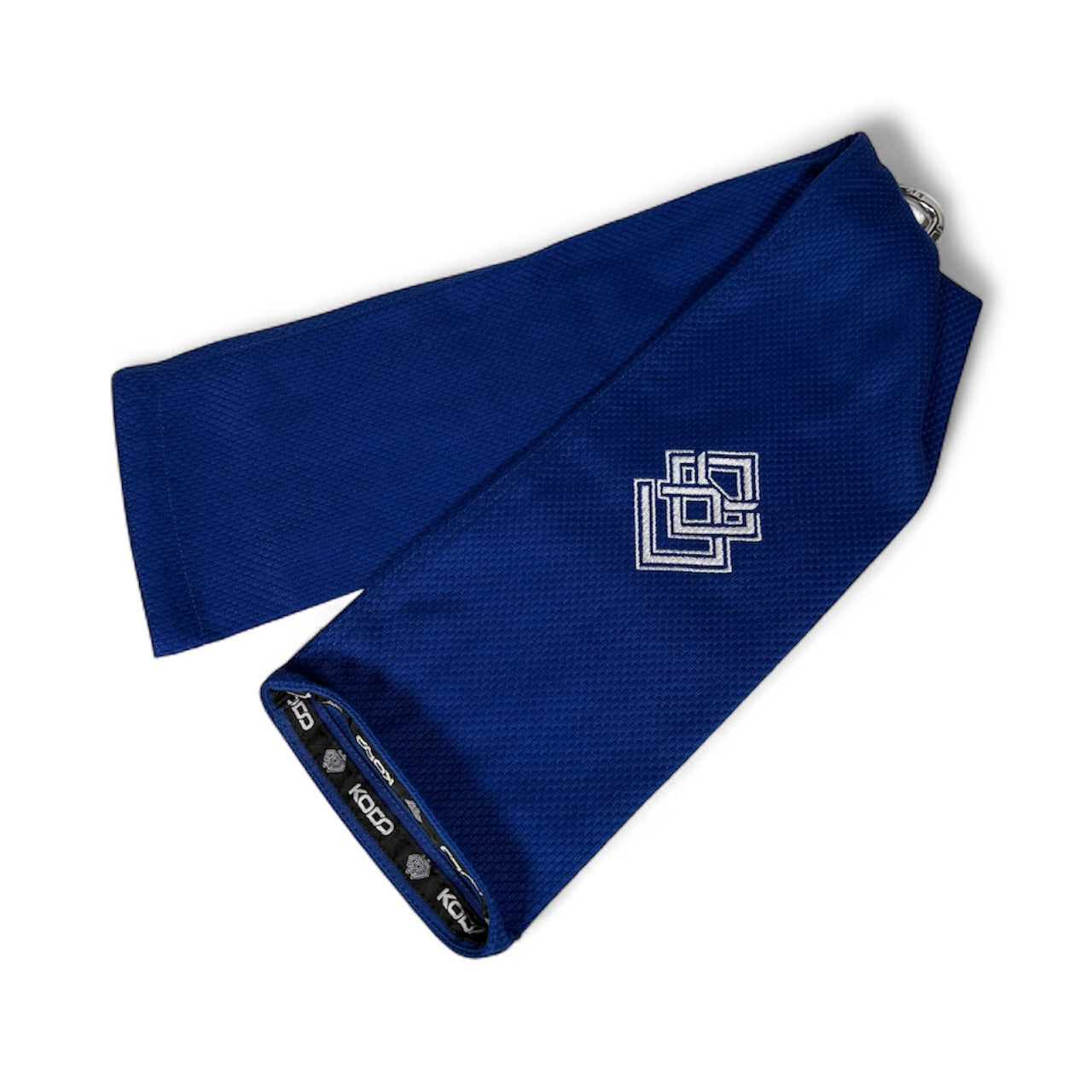 Blue Kodo Gi Grip with embroidered logo, featuring a custom aluminum carabiner attached to it used for martial arts such as BJJ and Judo and Grip Strength. These are premium Jiu Jitsu Grip trainers and Judo Grip Trainers. 